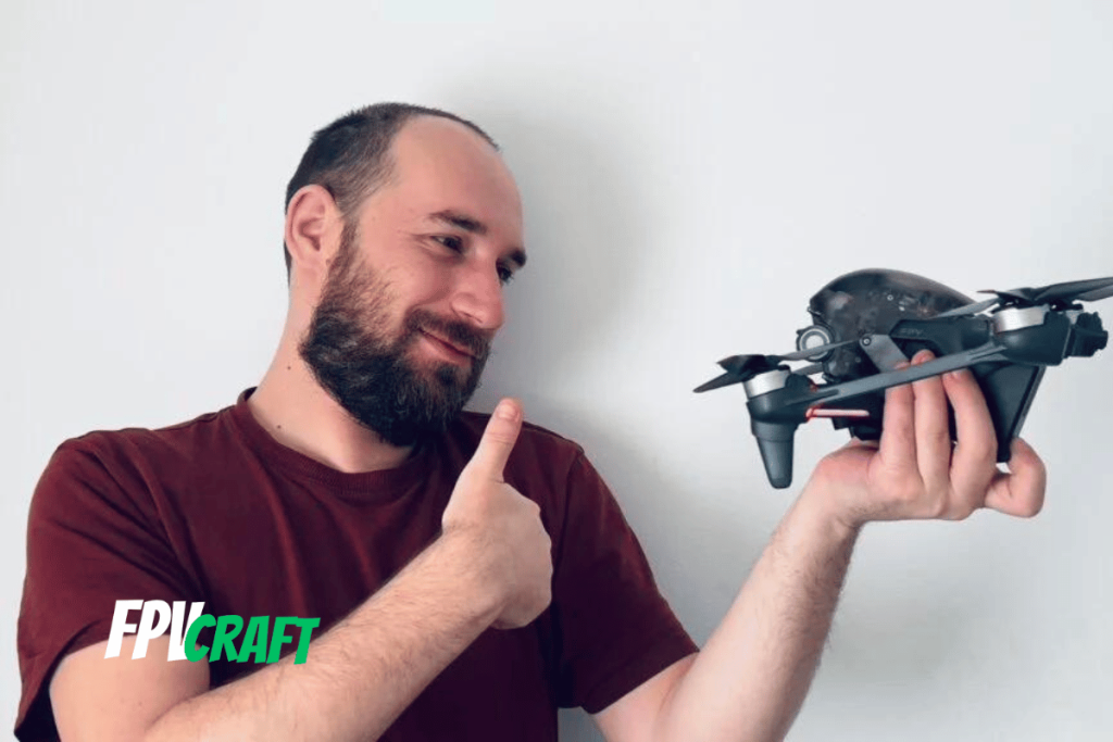 Gabriel Mihalcea (the author) giving thumbs up to an FPV drone (DJI FPV)