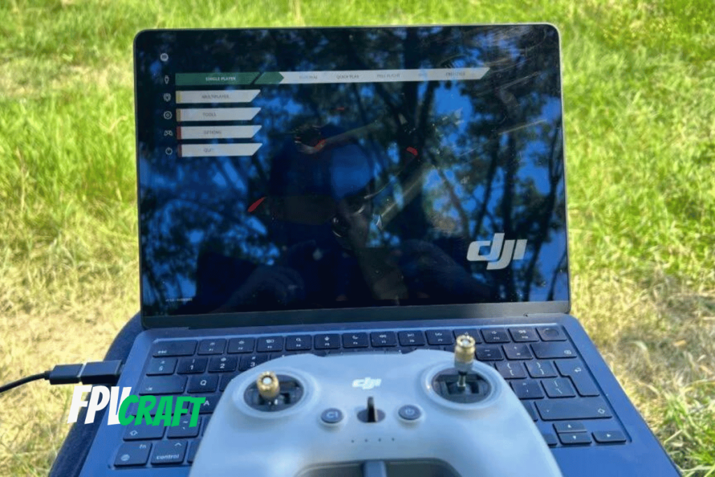 dji fpv remote controller 2 on macbook air outdoors
