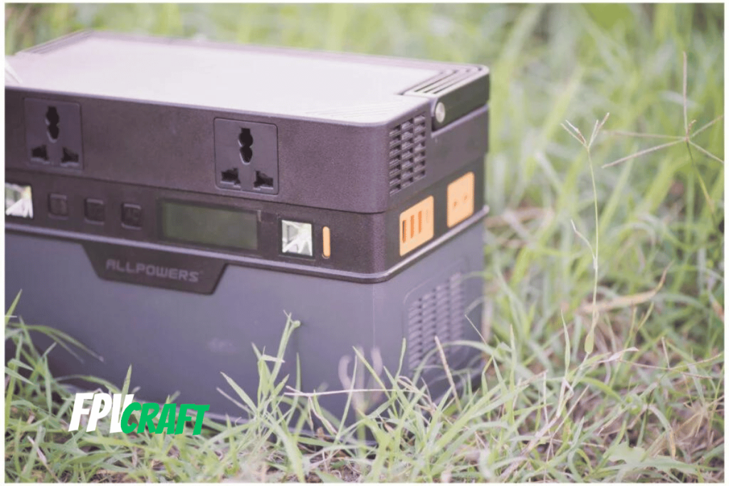 allpowers 606w unit outdoors in grass