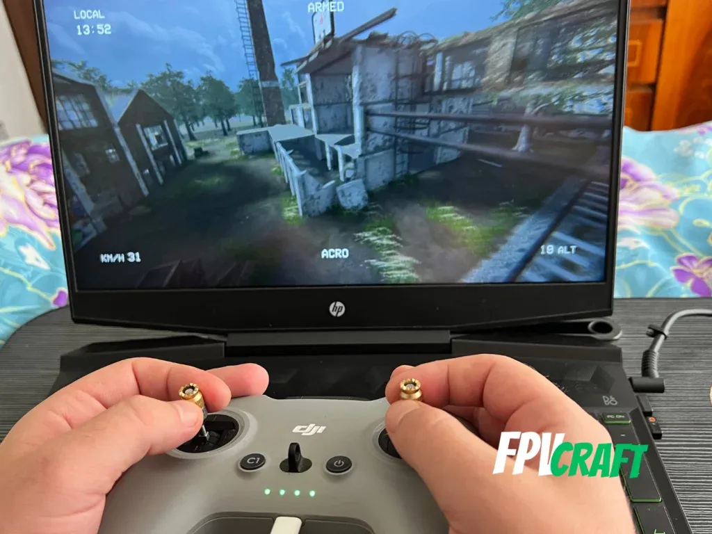 dji fpv remote controller 2 in front of fpv skydive simulator