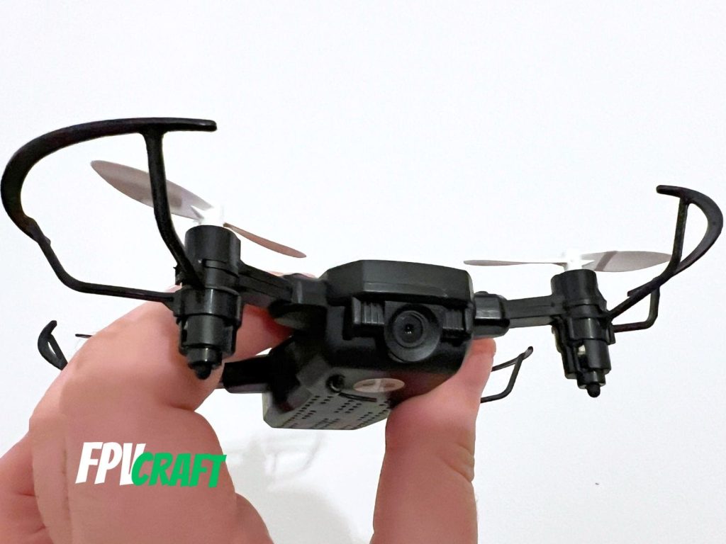 gabriel mihalcea (the author) holding a cheap drone in hand